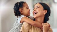 Girl embracing her mother